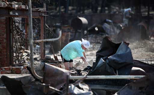 руины своего сгоревшего дома в Воронеже